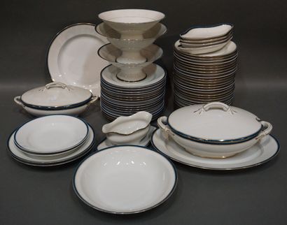 null White porcelain dinner service with blue border. 59 pieces (cracks, chips).