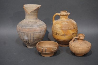 null Lot including a jug with two handles, a cup with pedestal, a jug with carinated...