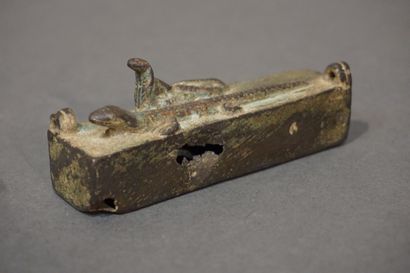 null Rectangular sarcophagus with two suspension brackets representing a lizard and...