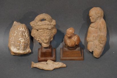 null Lot including a female bust, a head of Serapis, a standing Harpocrates, a bald...