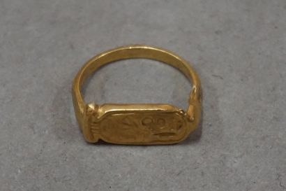 null Ring in gold plate with a bezel in the form of a cartouche inscribed in hieroglyphic...