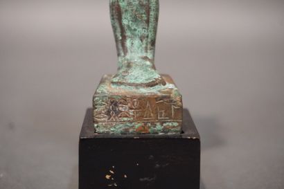 null Statuette of Osiris standing and wearing the Atef crown, the posticular beard,...