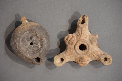 Lot of two oil lamps, one with a round spout...
