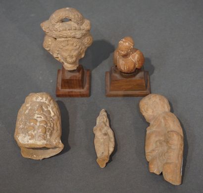 Lot including a female bust, a head of Serapis,...