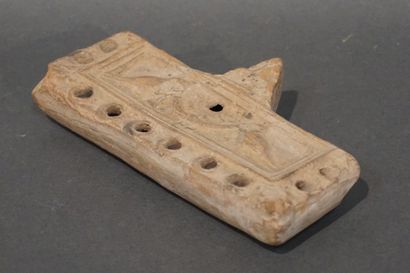 null Rectangular oil lamp with ten spouts and a medallion representing two doves...