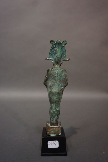 null Statuette of Osiris standing and wearing the Atef crown, the posticular beard,...