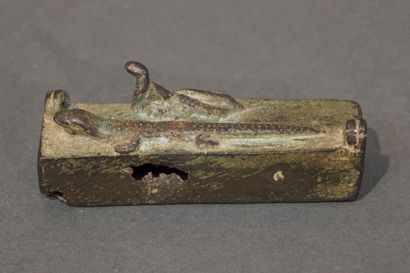 null Rectangular sarcophagus with two suspension brackets representing a lizard and...