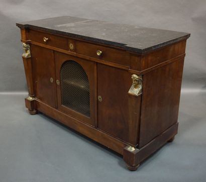 BUFFET 
Mahogany and mahogany veneer sideboard with three doors, one of which is...