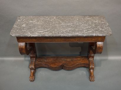 Console 
Mahogany and mahogany veneer console with hocked legs and a drawer in the...