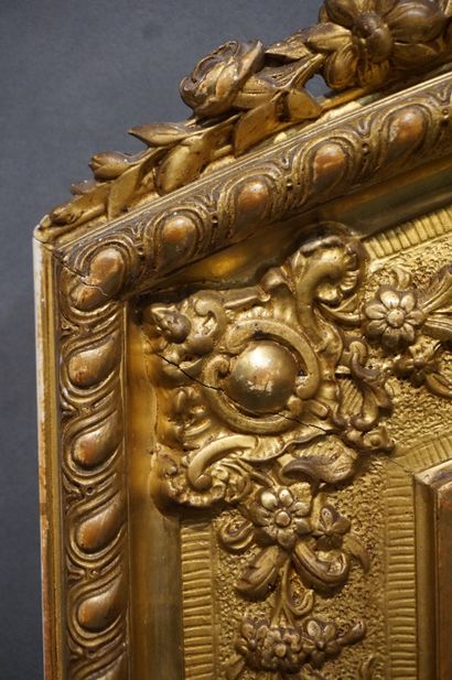 MIROIR Gilded and carved wood mirror with openwork frame, decorated with friezes...