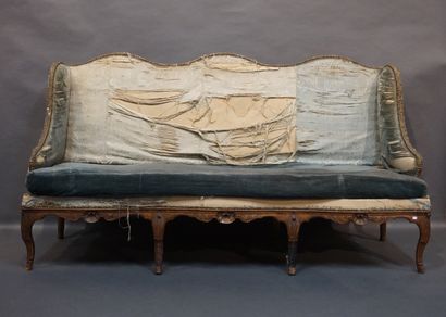 Canapé Sofa in natural wood carved with shells, upholstered with green velvet (restorations)....