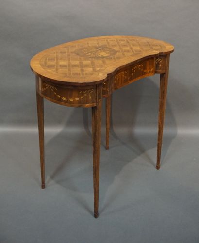 Table A kidney-shaped breakfast table; the top inlaid with crosses centered on a...
