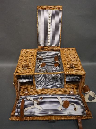 null Table stand and wicker picnic trunk.