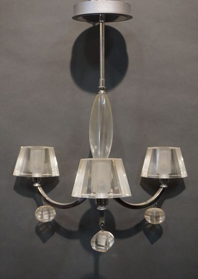 null Chandelier with three arms of light in chromed metal and glass, with pendants....