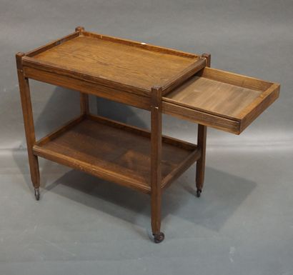 null Wooden table on wheels with two tops and a side drawer. 69x65x41 cm