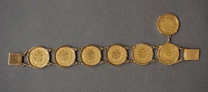 Bracelet Bracelet en or serti de six pièces de vingt francs françaises et d'une pièce...