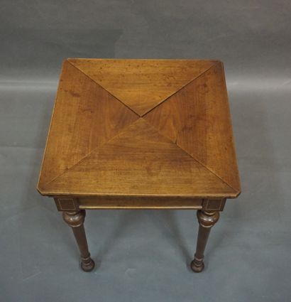 null Mahogany "wallet" game table engraved with golden nets. Directoire style (wear)....