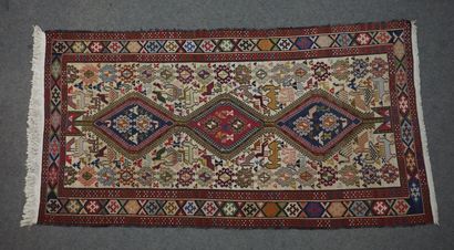 null Carpet with three medallions decorated with animals on a beige background. 201x110...