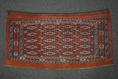 null Saddle with small white medallions on red background. 116x61 cm