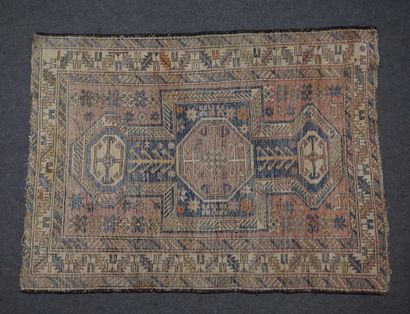 null Carpet with blue cross decoration on beige background (worn). 136x101 cm