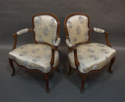 FAUTEUILS Pair of cabriolets armchairs in natural wood. Old work of Louis XV style....