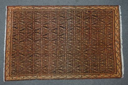 SAROUK Fine and ancient Sarouk carpet decorated with scrolls, flowers and pink and...