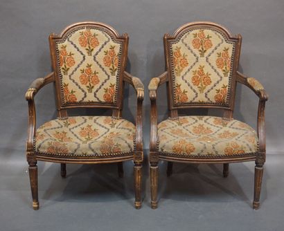 null Pair of armchairs in molded natural wood upholstered with tapestry. Louis XVI...