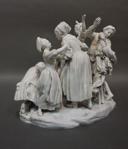 null Large group in white glazed porcelain, with seven characters with a basket of...