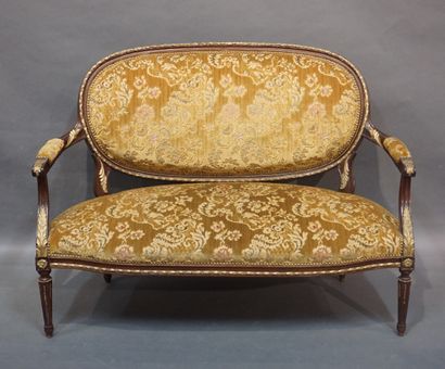 null Sofa in natural wood with gilded bronze ornaments, upholstered in green velvet....