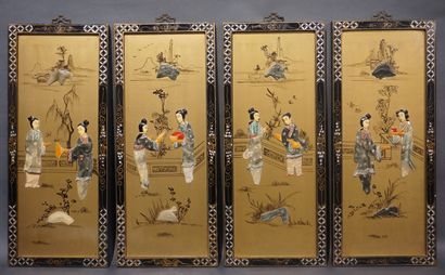 null Four Asian panels in black lacquered wood and gilded with characters on terraces,...