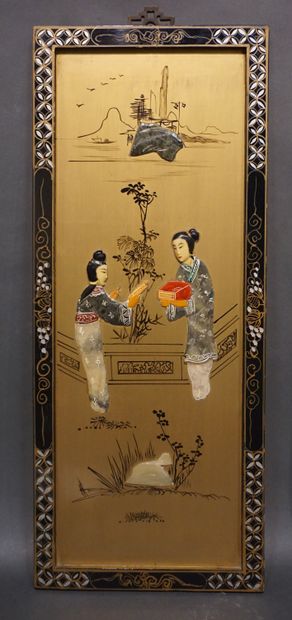 null Four Asian panels in black lacquered wood and gilded with characters on terraces,...