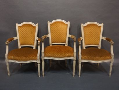 null Three armchairs in molded wood, white lacquered, upholstered with brown velvet...