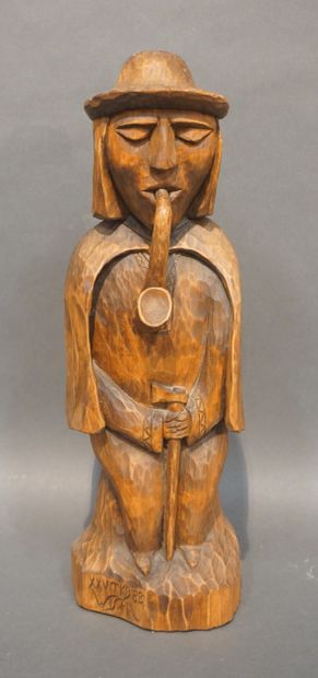 null Statuette of a man in carved wood. 43 cm