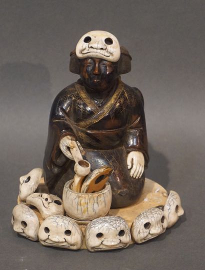 null Asian statuette: "Kneeling woman with masks". 13 cm