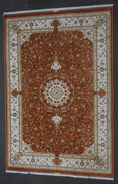 null Oriental carpet with vegetal decoration, with white central rose on a rusty...