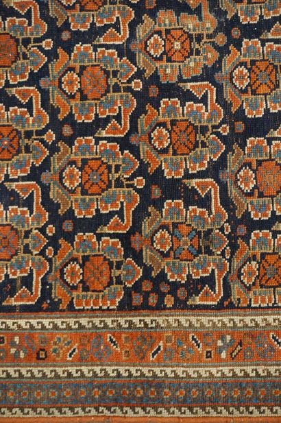 null Antique carpet with red decoration on navy blue background. 115x115 cm