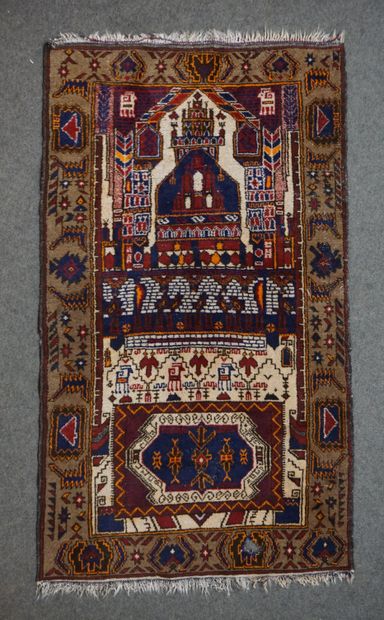 null Carpet decorated with blue and red palace on a cream background and brown border...