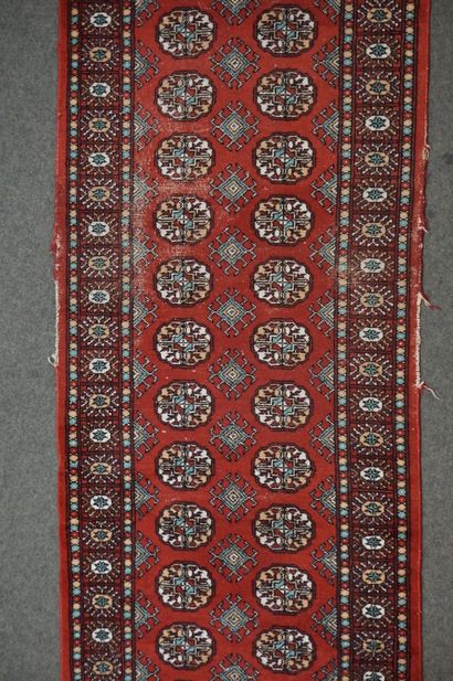null Gallery carpet with red background style boukhara (wear). 365x84 cm