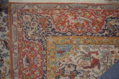 null Large carpet with two navy blue cartridges decorated with animals in a landscape...
