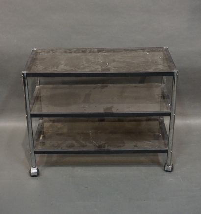null Serving table with metal wheels and three smoked glass tops. 68x87x43 cm