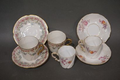 null Two porcelain coffee services, one in white and gilded Limoges with friezes...