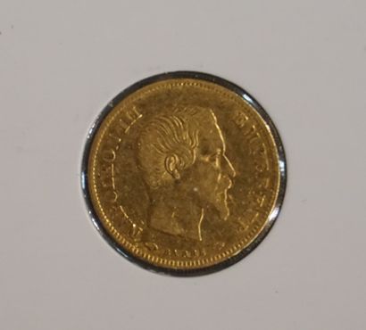 Une pièce de dix francs en or de 1857 (s...