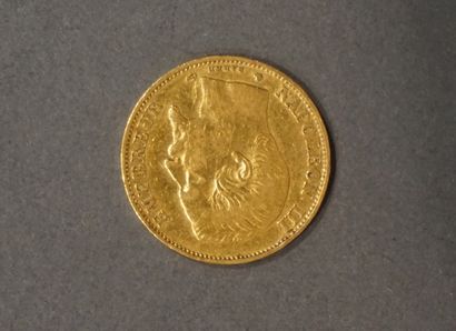 Une pièce de vingt francs en or (6,4 grs...
