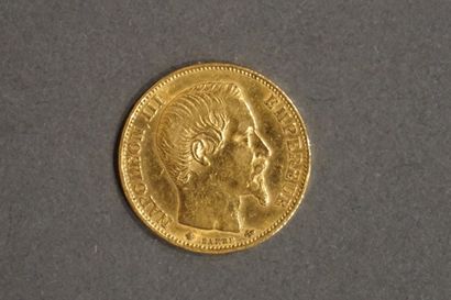 Une pièce de vingt francs en or (6,4 grs...
