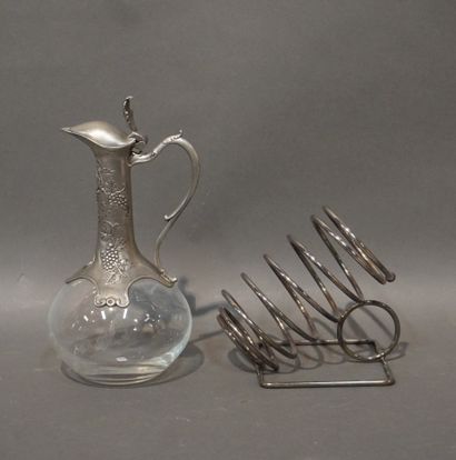 null Silver-plated metal bottle holder and pewter-mounted glass ewer (26 cm).