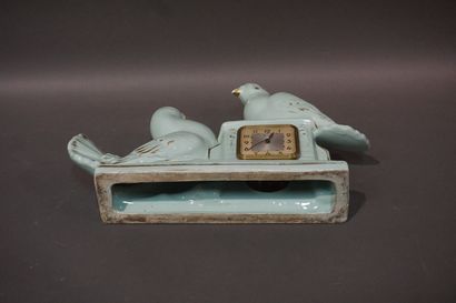 null Celadon earthenware Scout clock decorated with doves. 26x38x10 cm