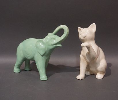 null Two ceramic animals: white cracked "Cat" (24 cm) and green "Elephant".