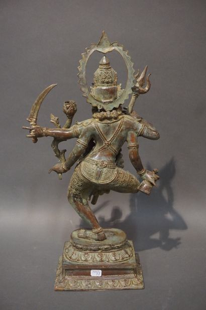 null Asian statuette in green patinated metal: "Dancer with four arms". 41x23x12...
