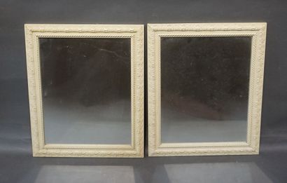 Pair of cream lacquered wood mirrors. 60x50...