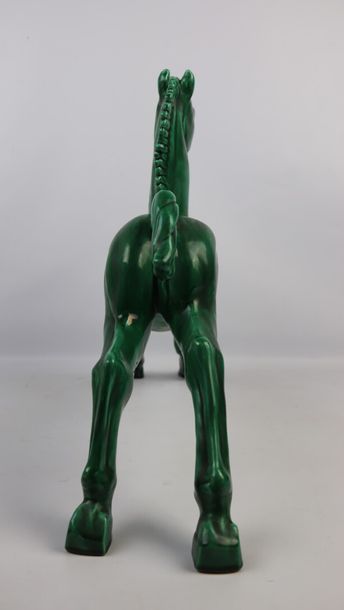 null Paul MILET (1870-1950).

Cheval en céramique émaillée verte.

Signé au revers.

H_48...